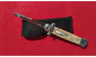 COUTEAU AUTOMATIQUE LAME RENTRANTE